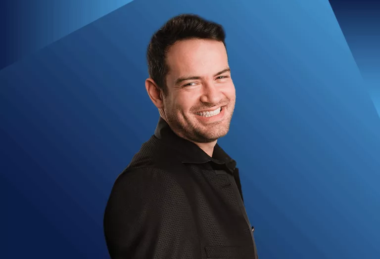 Violinist Marc Bouchkov with a blue background